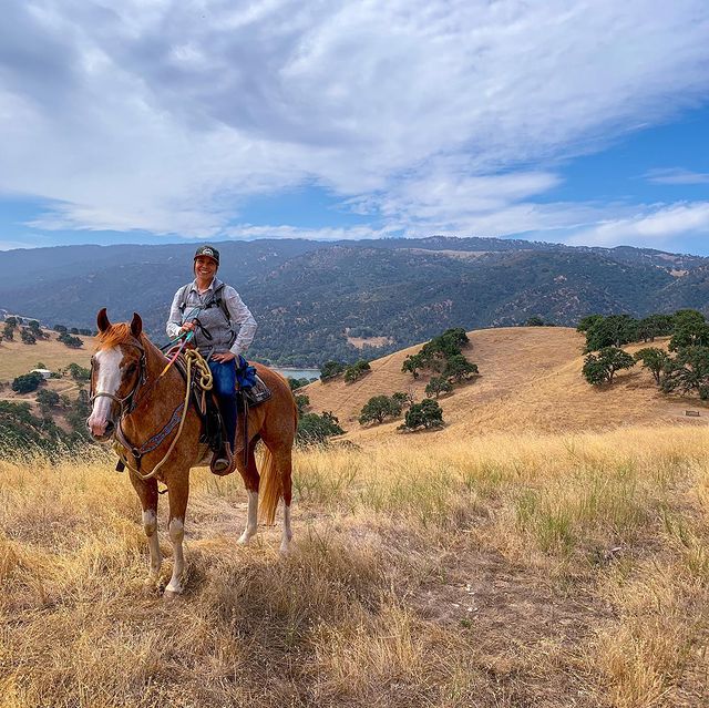 woman riding horse at del valle regional park