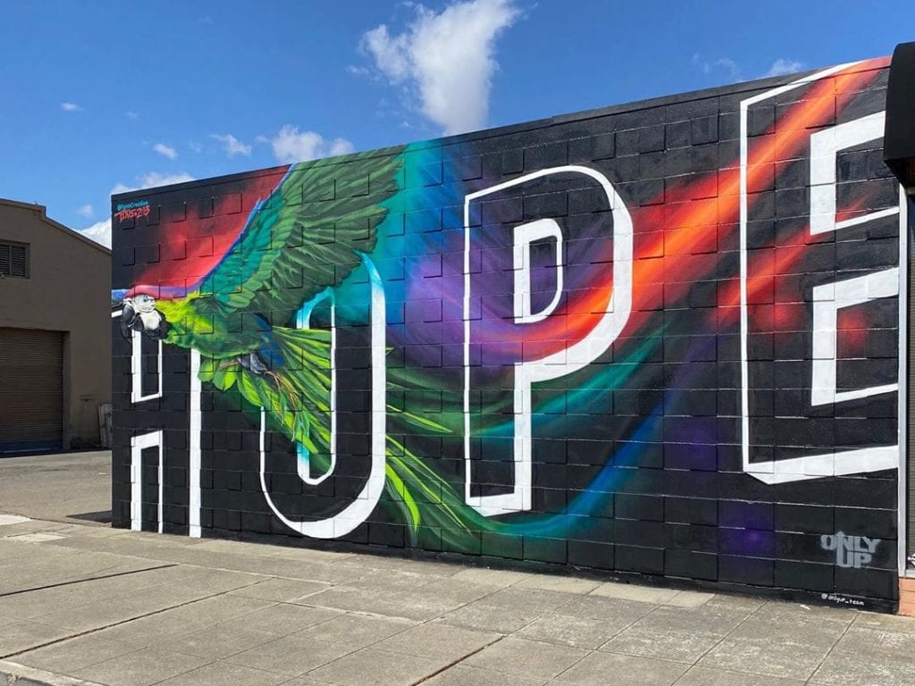 mural that says Hope with large bird