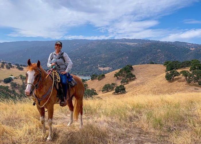 woman riding horse at del valle regional park